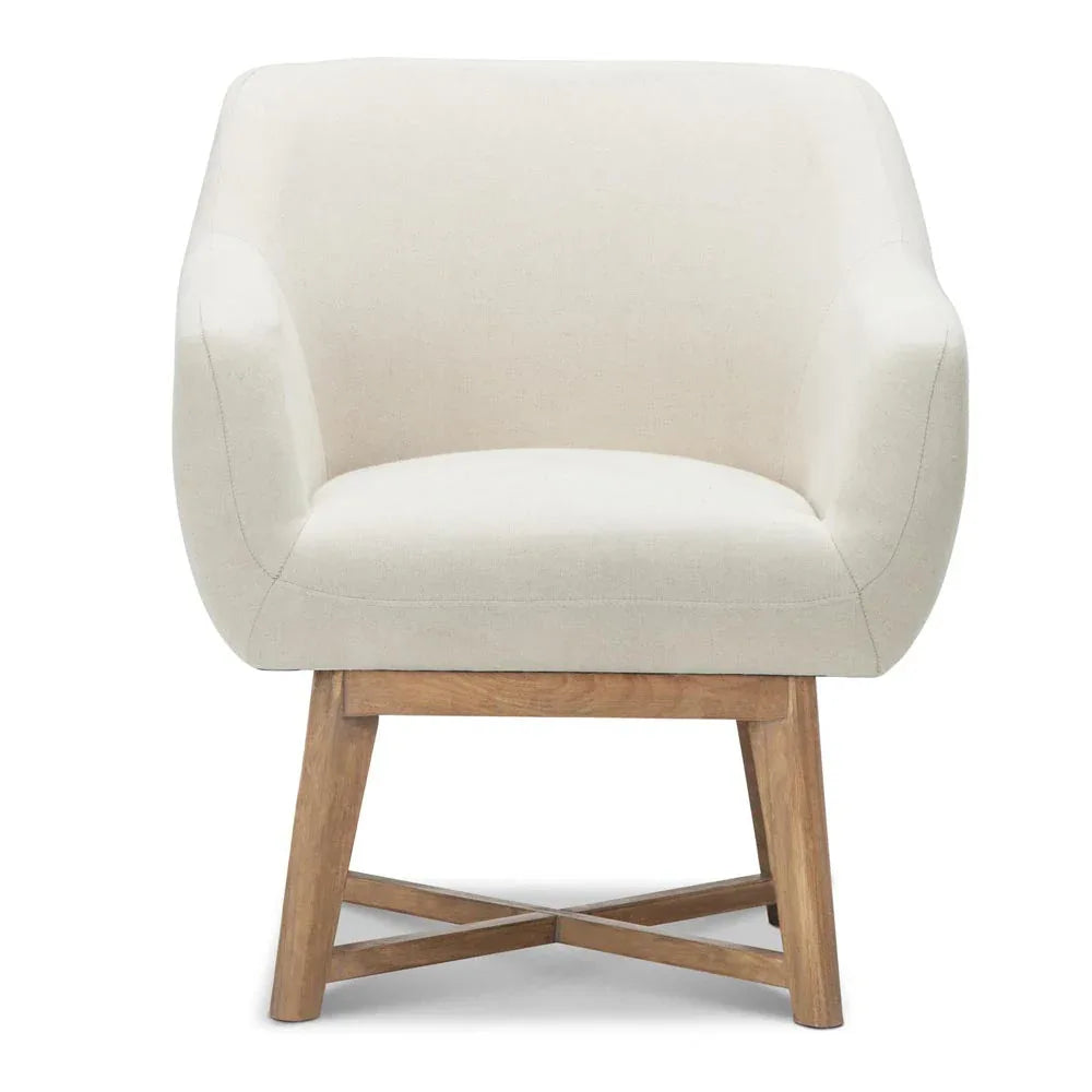 Close-up of armchair seat highlighting smooth round edges and soft beige fabric