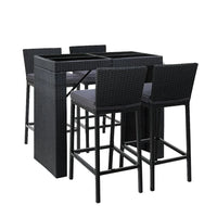 Gardeon Outdoor Bar Set with rattan stools and glass tabletop on a wooden deck