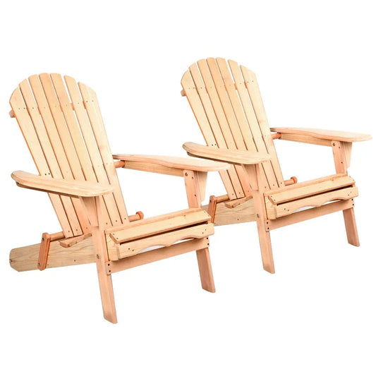 Pair of wooden outdoor beach chairs with wide armrests in sunny backyard setting.