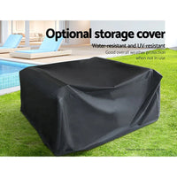 Weather-resistant dark cushions on woven outdoor sofa set with coffee table.