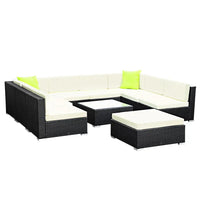 Black wicker 10-piece outdoor sofa lounge set with beige cushions and side tables
