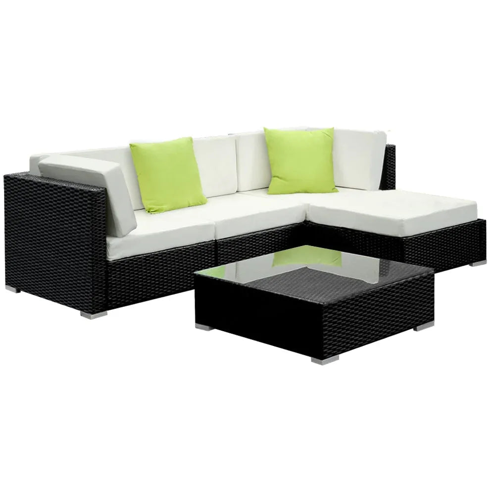 Side view of black aluminum framed outdoor wicker sofa with removable cushions