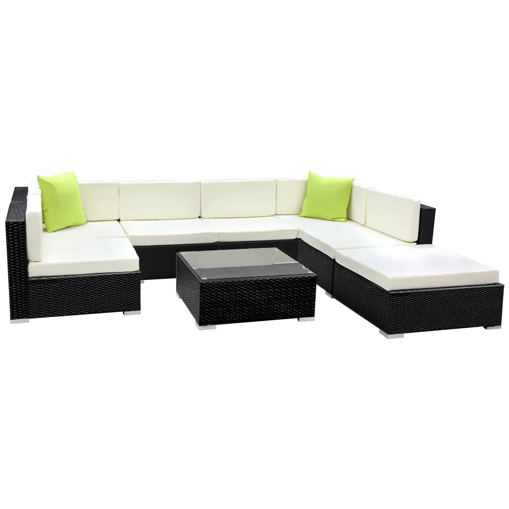 Gardeon 8-piece outdoor sofa set with black wicker and cream cushions in garden setting.