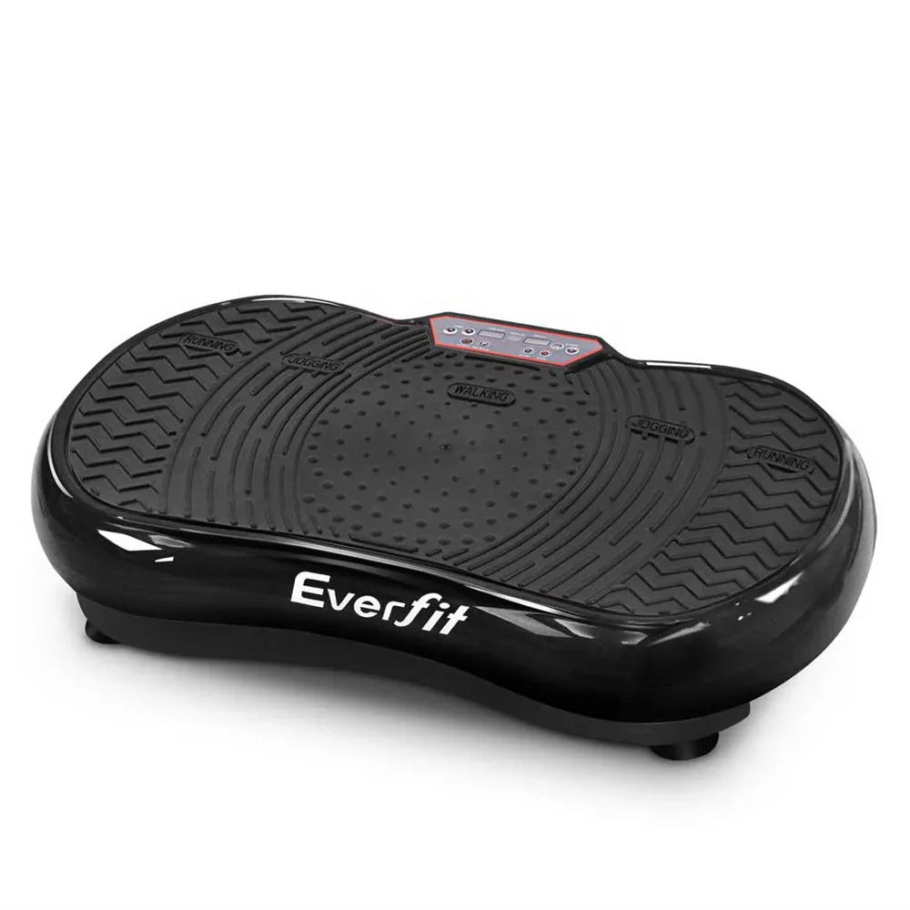 Black round vibration machine plate platform with digital display on top for home fitness.