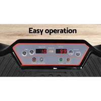 Vibration machine placed in a home gym setting with bright interior background.