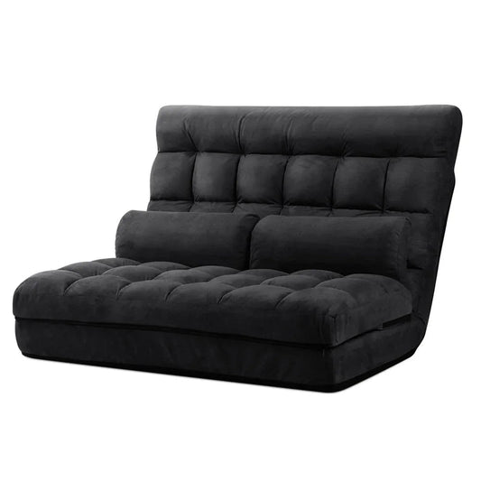 Charcoal suede 2-seater lounge sofa bed in flat, floor-level position with plush cushions.