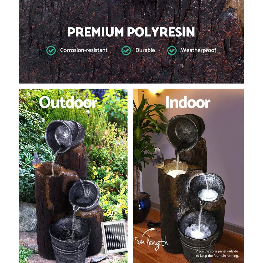 Black solar-powered garden fountain showing water cascading gently through all three tiers.