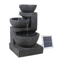 Three-tier blue polyresin solar bird bath fountain with water flowing from top to bottom