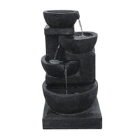 Side view of blue solar-powered bird bath fountain with water fountain tiers