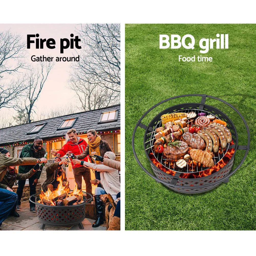 Portable metal fire pit grill setup with fire and cooking grate outdoors.