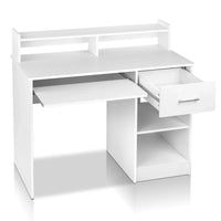 White office computer desk with open and closed storage compartments on the side.