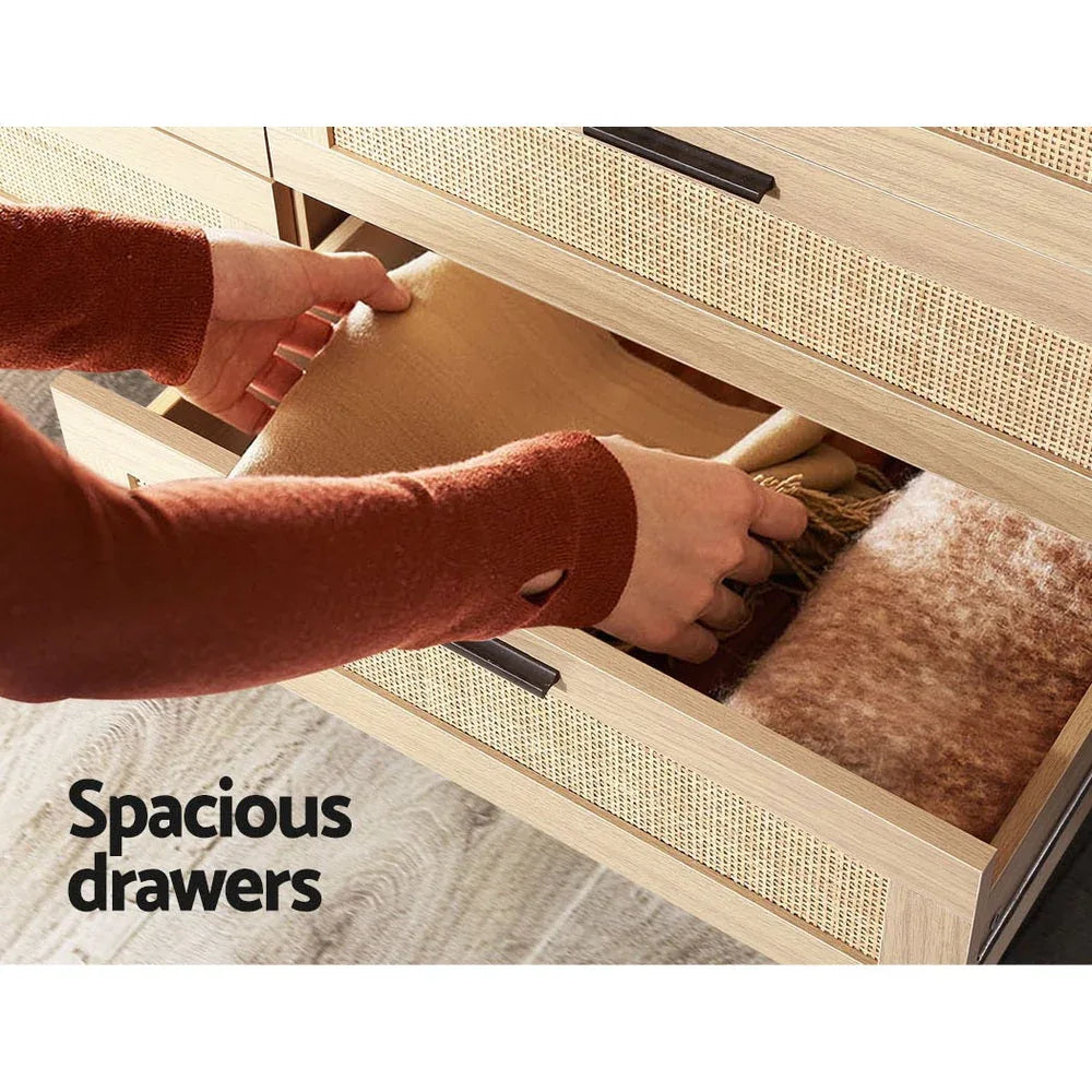 Close-up of rattan drawer front texture on six-drawer bedroom cabinet.