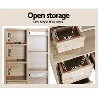 Dressing table showing multiple storage compartments and sliding mirror in modern design.