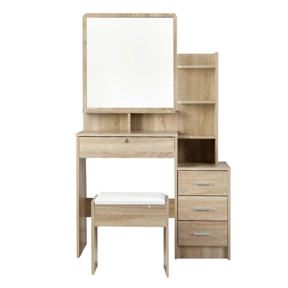 Thick-padded white dressing stool positioned under the dressing table.