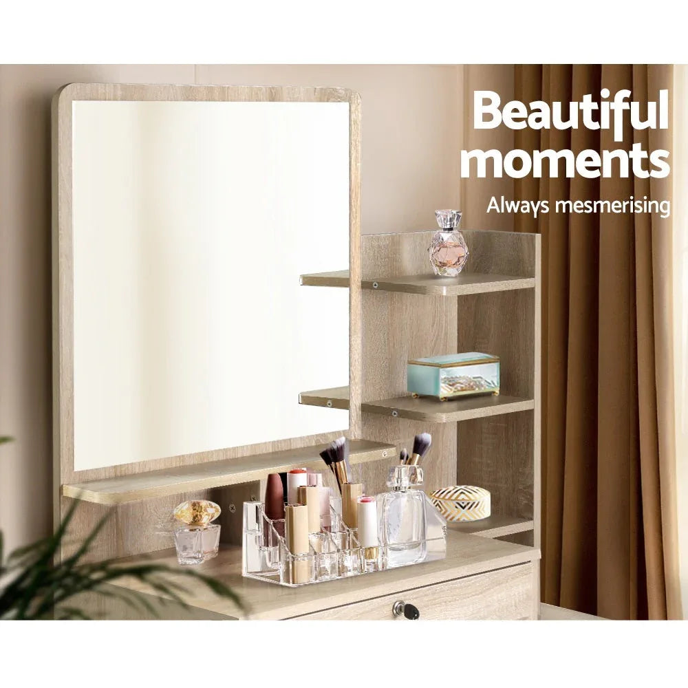 Open drawers of vanity organizer showing ample storage for makeup accessories.