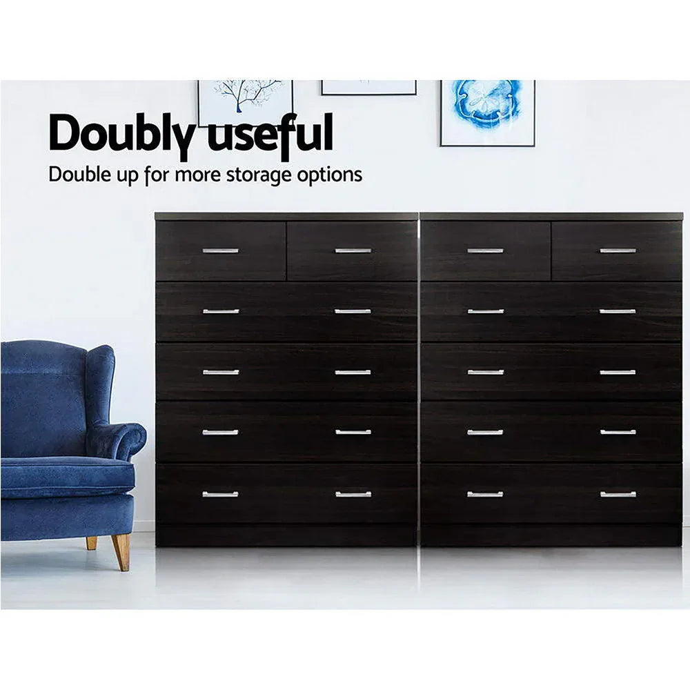 Artiss 6-drawer tallboy cabinet shown with decorative items on top in room.