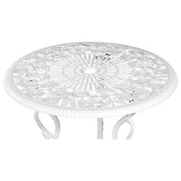 Detailed look at the floral design on white aluminium chair backrest in outdoor setting.