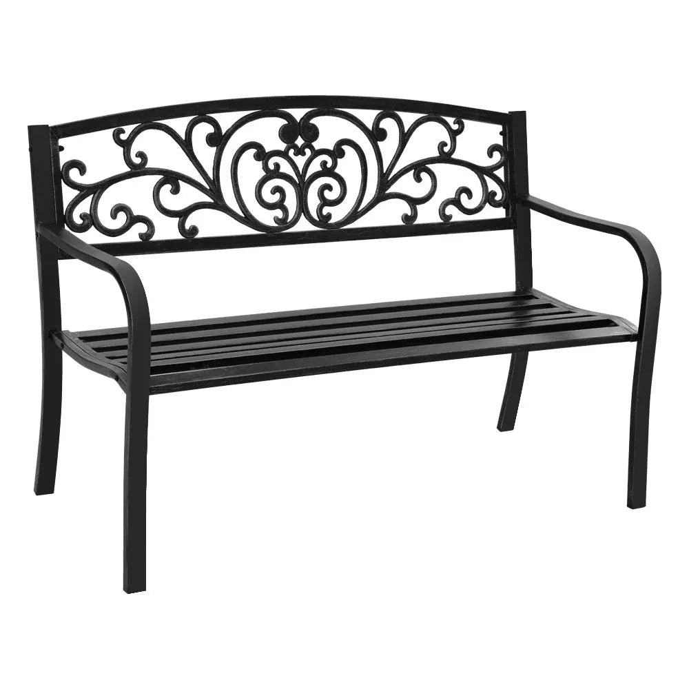 Black Victorian-style outdoor garden bench with floral-patterned backrest and ornate aluminum seat.