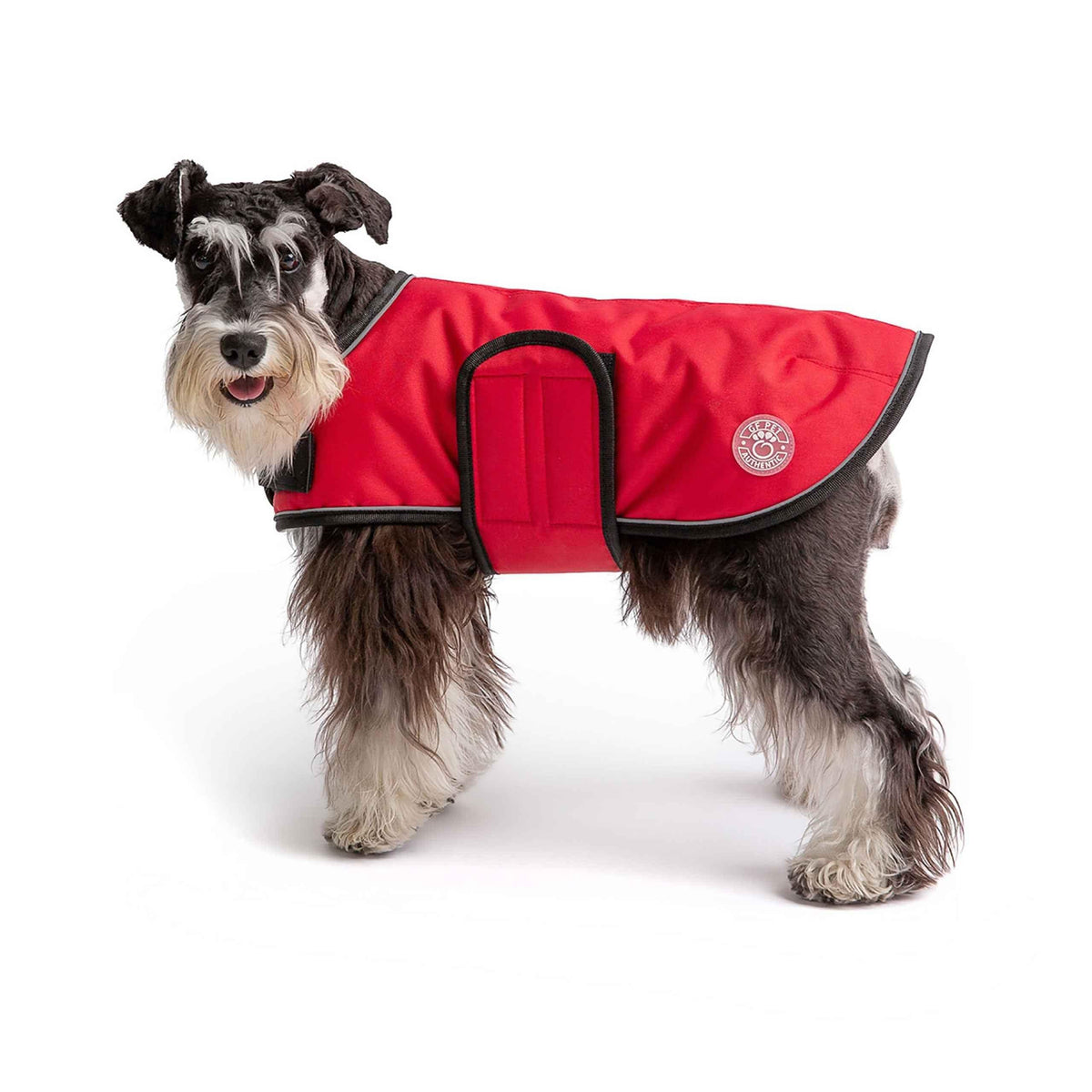 Adjustable velcro belly strap on red dog blanket jacket showing fitted rear design.
