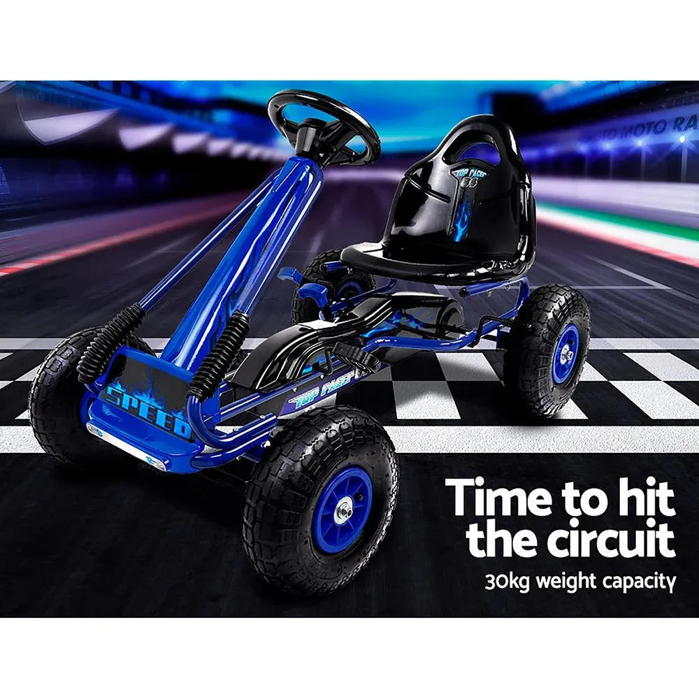 Blue pedal go kart from top angle displaying steering wheel and pedals.