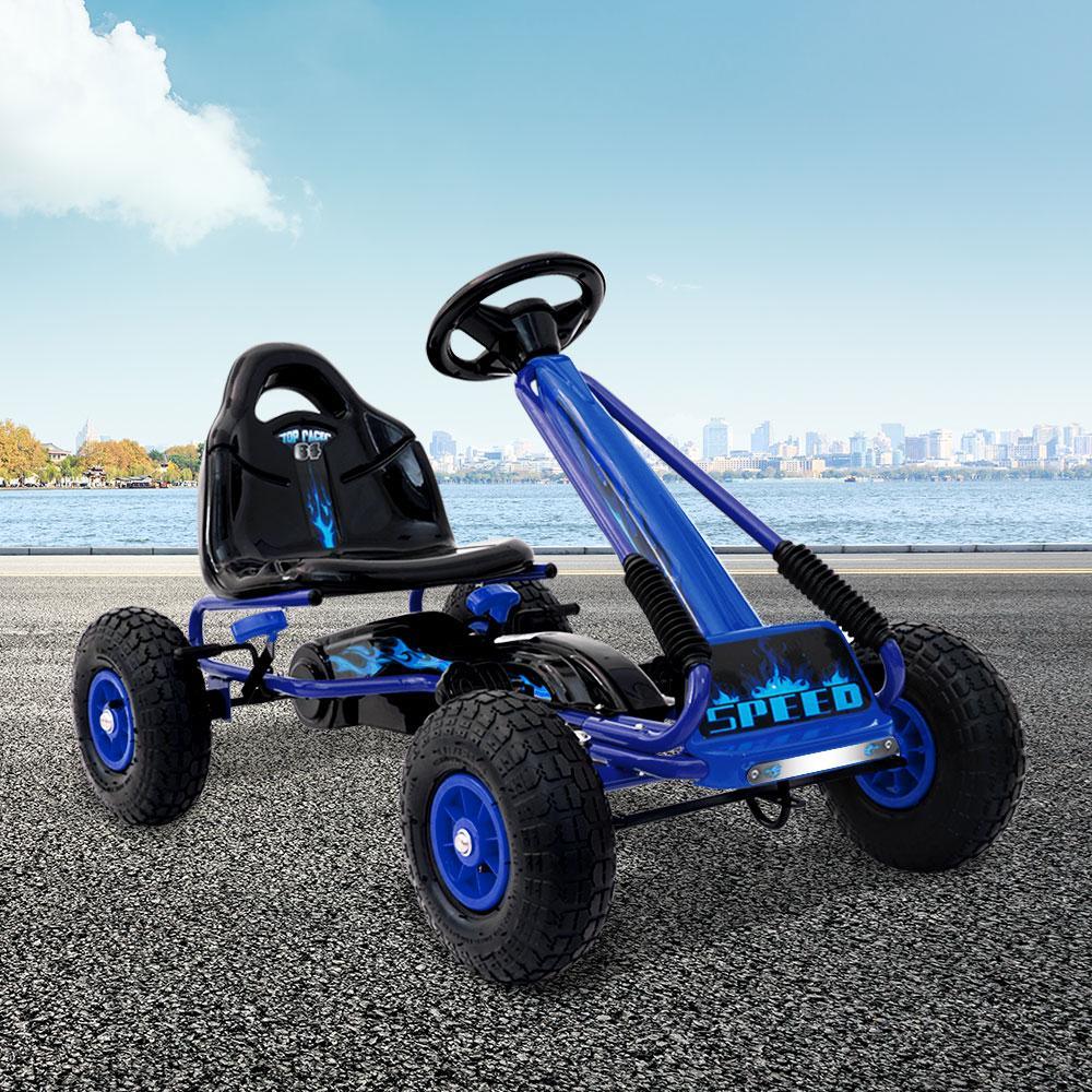 Blue kids pedal go kart racing bike positioned to show full body and wheels.