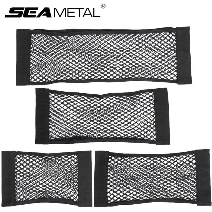 Black car trunk storage bag with multiple compartments and elastic strings holding items securely.
