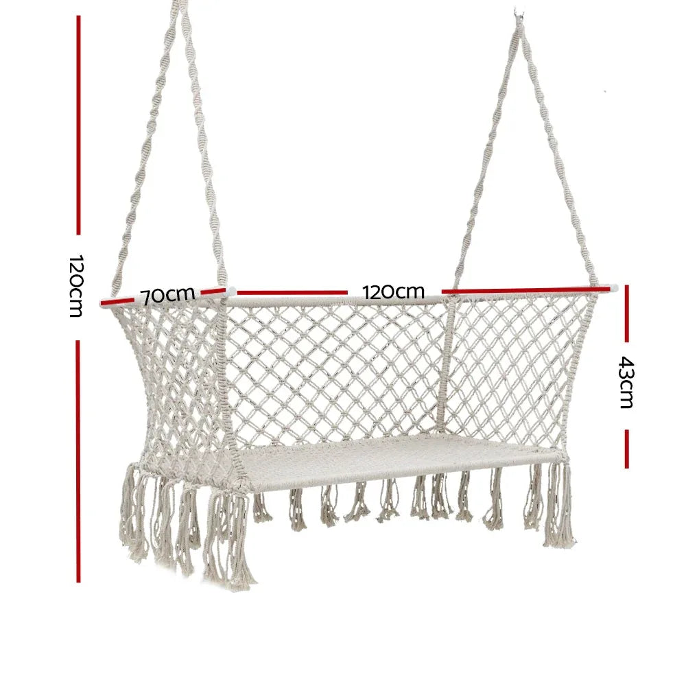Cream-colored two-person hammock chair viewed on a white background.