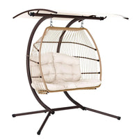 Gardeon hanging egg chair with broad adjustable canopy on steel frame in outdoor garden setting.