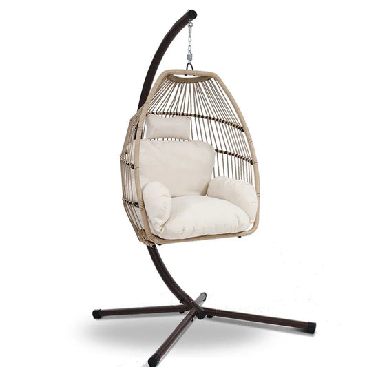 Close-up of the woven wicker rattan texture on the hanging egg swing chair.