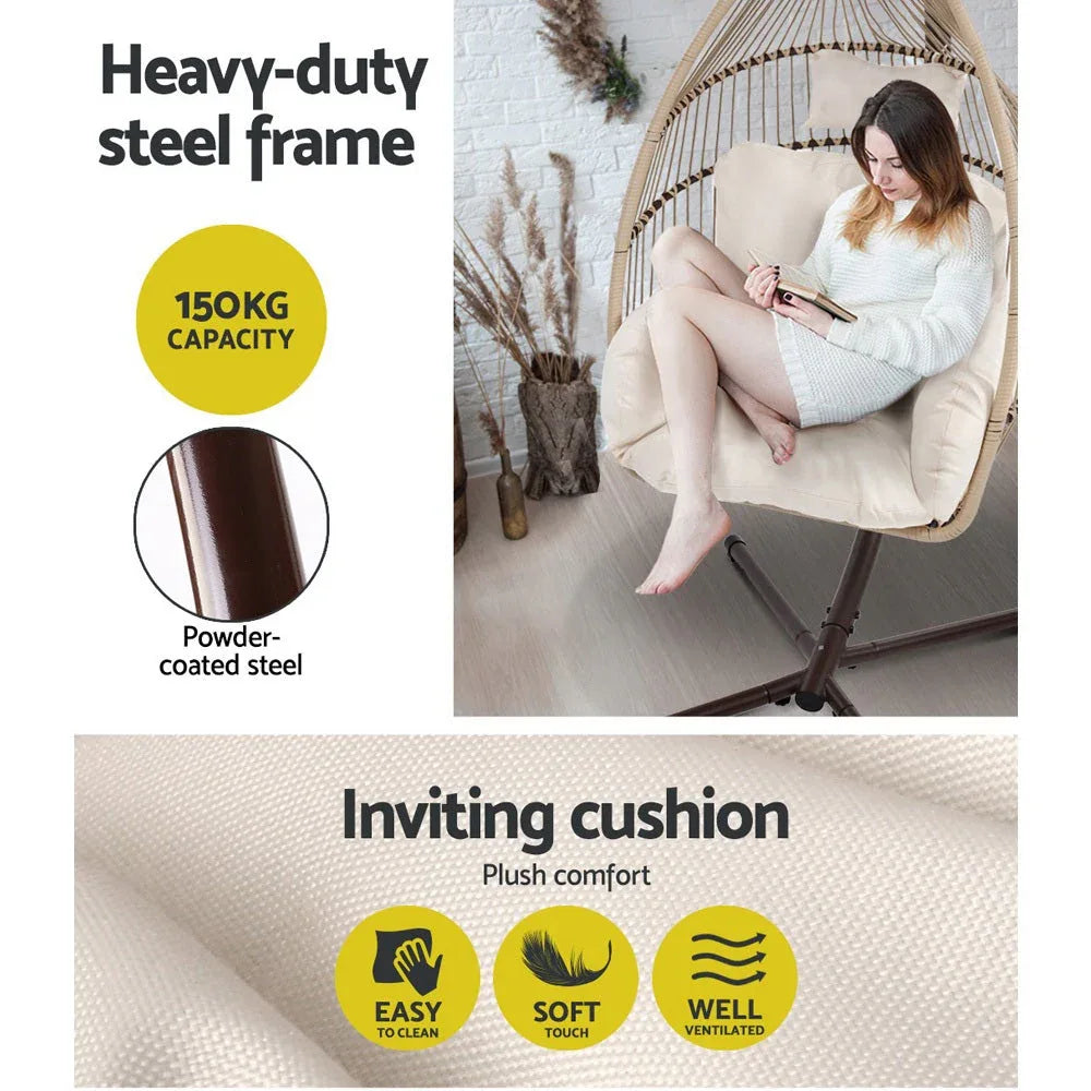 Wooden deck displaying the hanging egg chair with soft cushions for outdoor relaxation.
