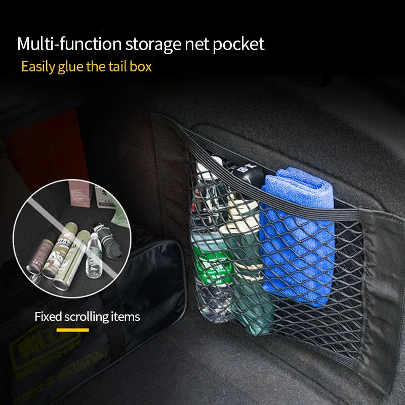 Car trunk organizer mesh net stretched inside vehicle storage area holding various objects.