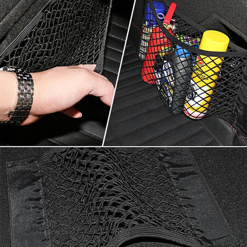 Car trunk mesh net organizer holding a fire extinguisher and other small items.