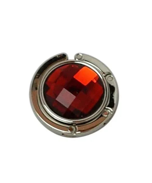 Red handbag hanger unfolded highlighting shiny rhinestone embellishment.