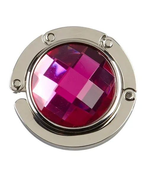 Hot pink handbag hanger folded flat highlighting sparkling rhinestone top.