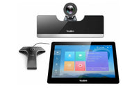 Demo kit including 5-inch conference phone, PTZ camera, and two wireless microphones on a white background