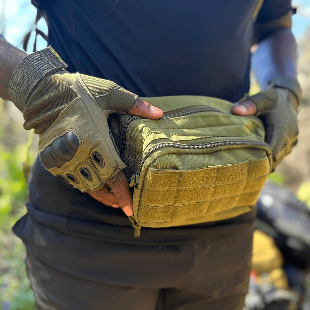 Folded green fingerless gloves emphasizing compact and durable construction for outdoor sports.
