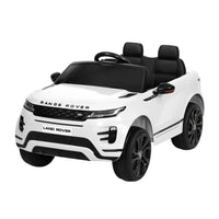 White kids ride on Land Rover Evoque electric car with steering wheel and realistic front design.