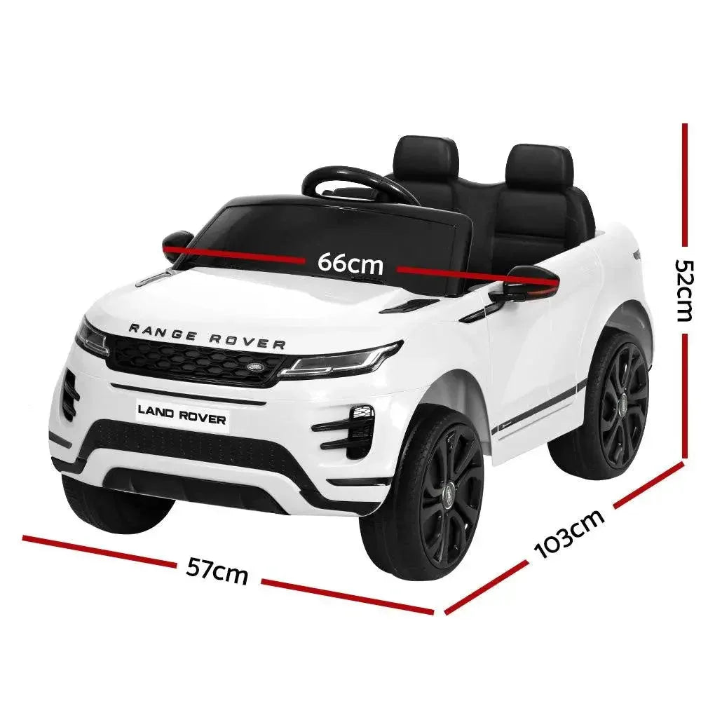 Side view of white electric Land Rover ride on car showcasing door and wheels.
