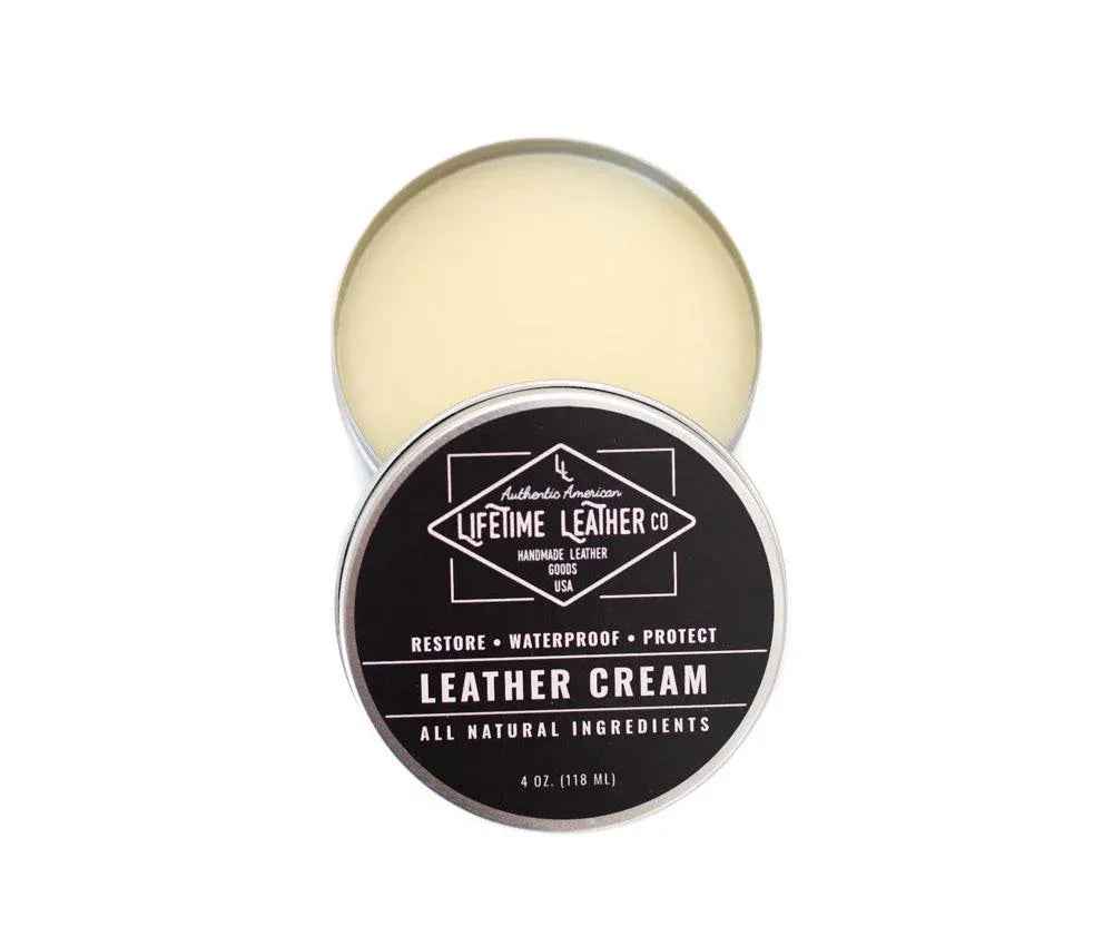 Leather cream conditioner jar with green cap displayed against white background