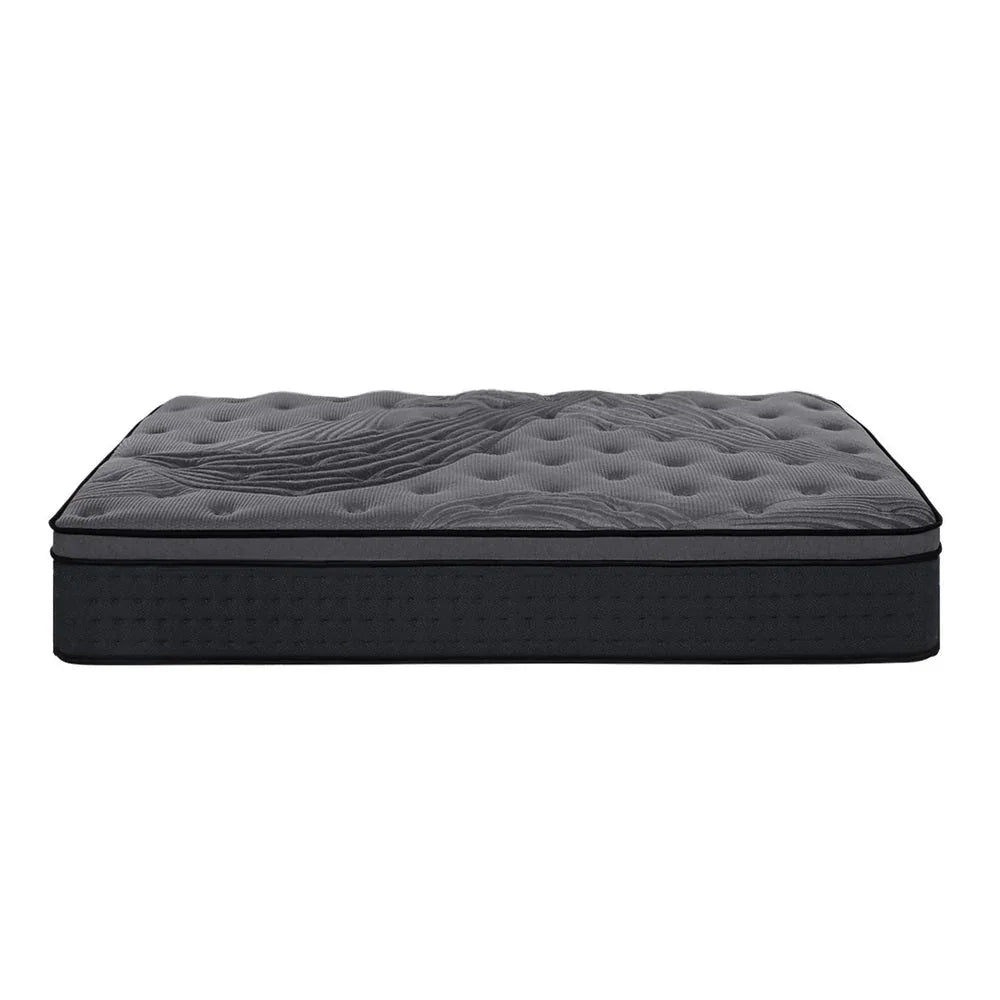Edge detail of black mattress showing premium stitching and bamboo charcoal knitted fabric cover.
