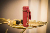 Pebble leather lipstick keeper with zipper, shown from the front
