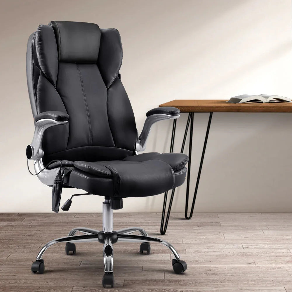 Front view of sleek black massage office chair with thick cushioning and arm supports.