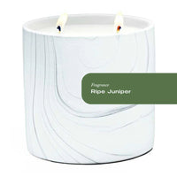 White marble ceramic candle vessel with gray and black swirls, 17oz Ripe Juniper scent.