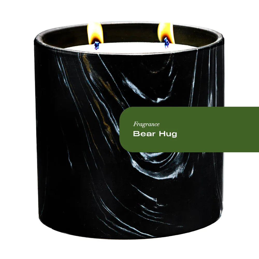 Black ceramic candle vessel with white and gold marquina swirl pattern, 17oz Bear Hug Candle by Sky Erebus.