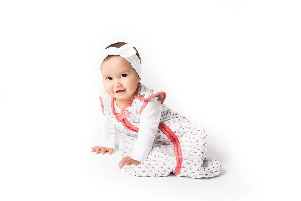 Lightweight baby sleep bag in beige color displayed on a clean white background.