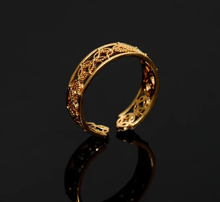 Hélodie Ring shown at angle emphasizing its delicate and adjustable gold band