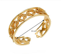 Side profile of the Hélodie Ring showcasing its thin, smooth gold band