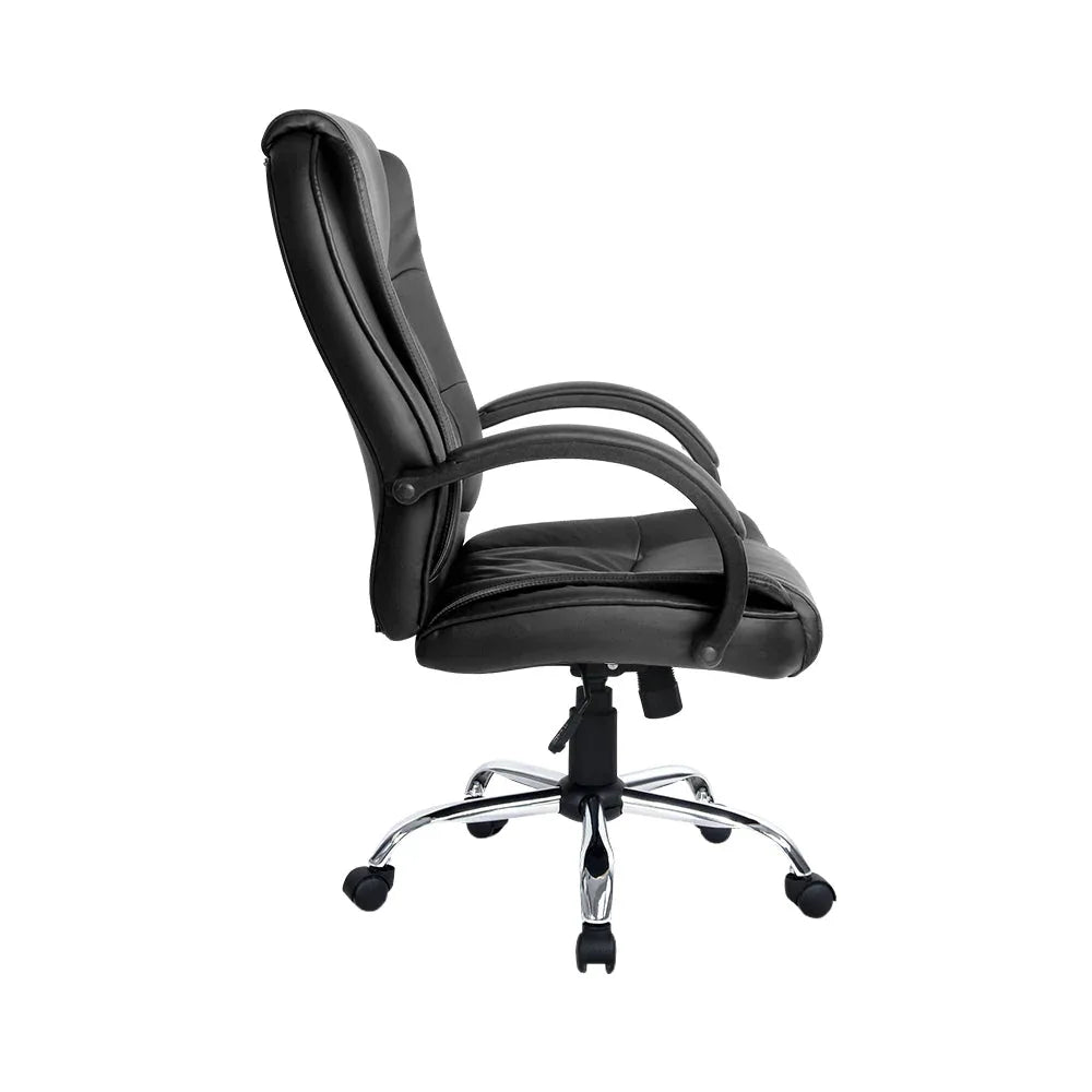 Black executive office chair showing chrome base with five caster wheels on wooden floor.