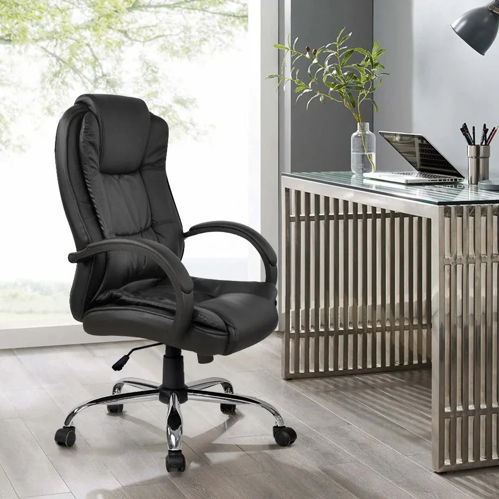 Assembled black PU leather office chair with ergonomic design on hardwood floor in office.