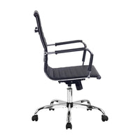 Close-up of black faux leather upholstery and padded armrest on the gaming office chair.